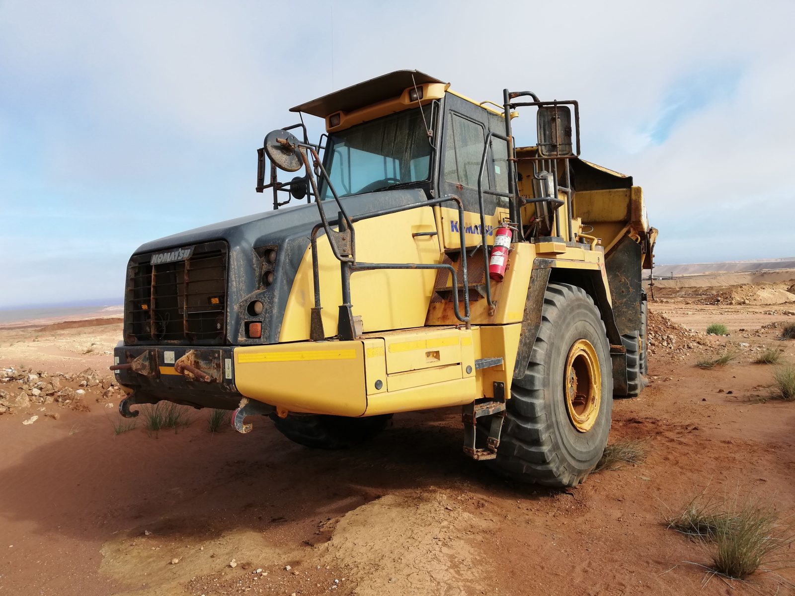 Komatsu articulated dump truck on a mine haul road